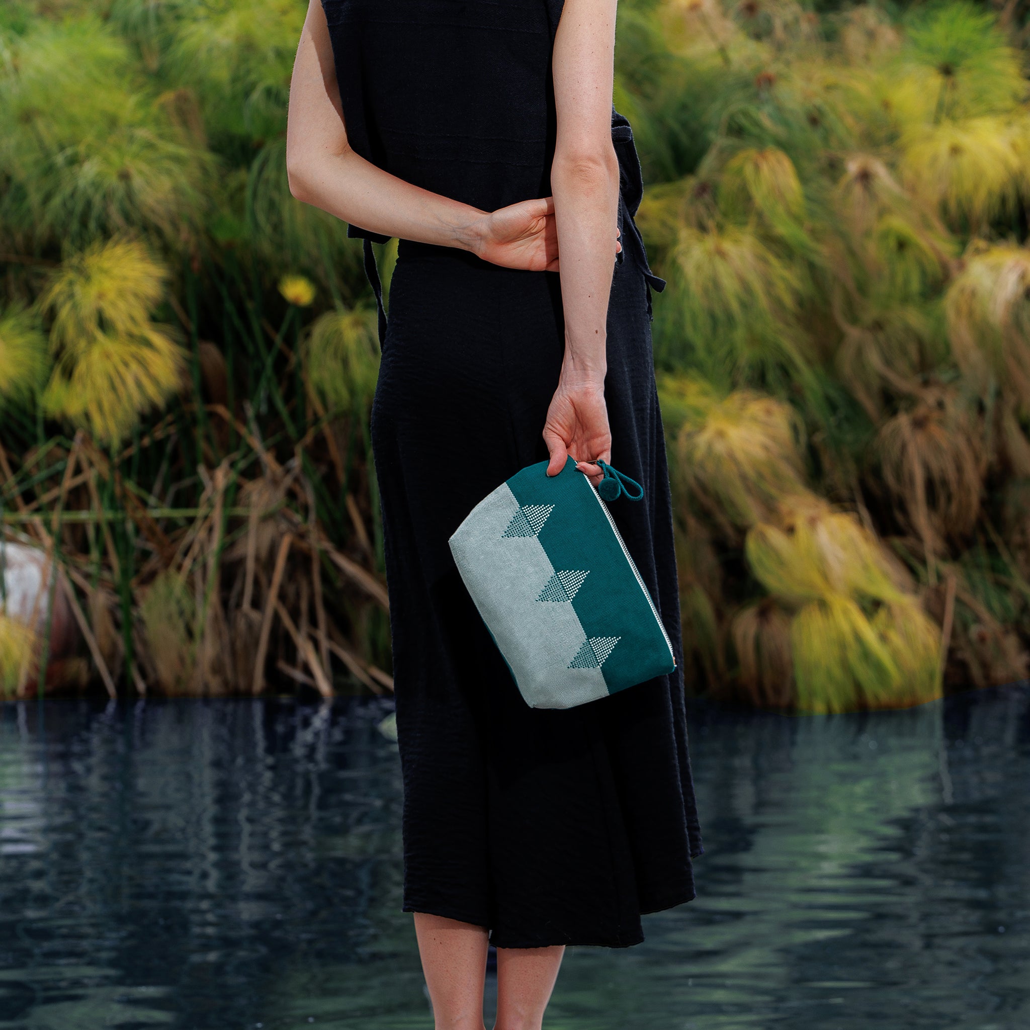 RES2601-Cristina_Cosmetic_Pouch-Tealoom-Far_over_the_shoulder_2f1ebce5-2451-4286-bce8-52beba6e234b.jpg